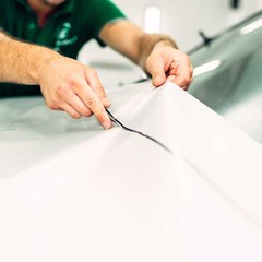 surface protection film on white car hood