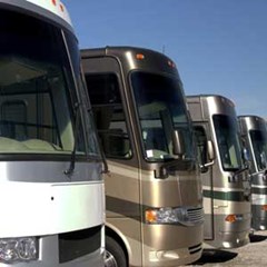 RVs parked in an open parking lot